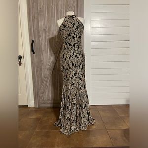 Black and Gold lace forms gown